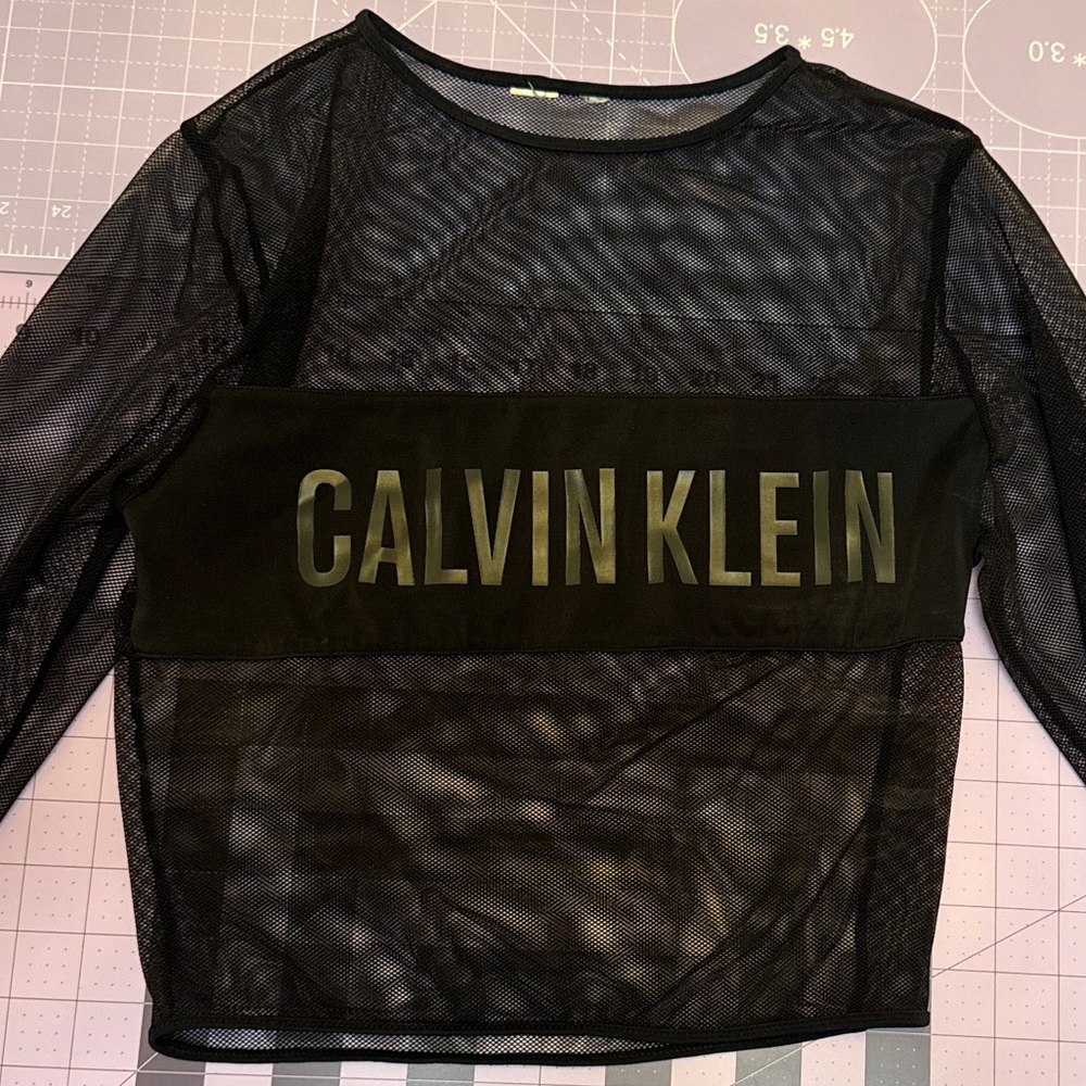 Calvin klein black mesh top
size small 
excellent condition, like new
